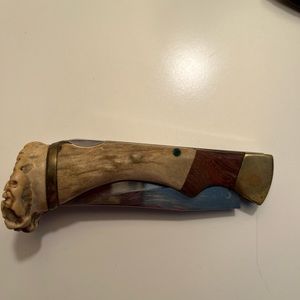 Custom designed deer horn steel blade knife and snake skin sheath